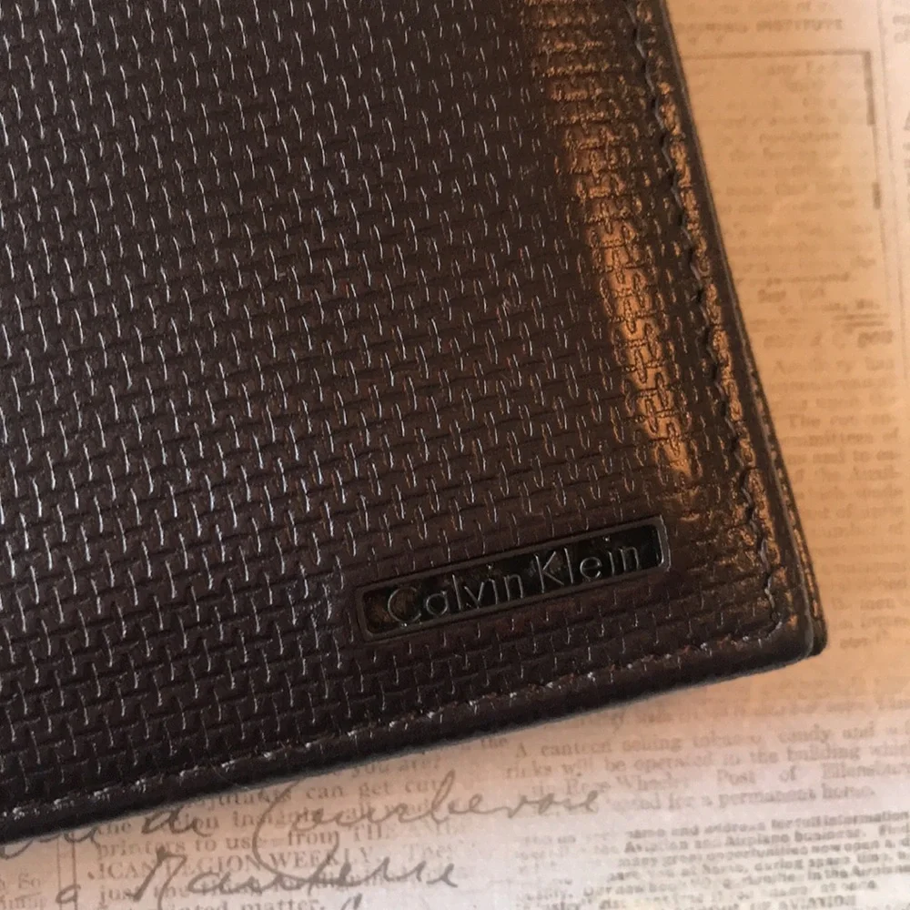 Calvin Klein Textured Leather Bi-Fold Wallet